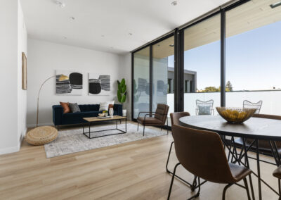 Family Room and Kitchen with Private Balcony of a Staged Home at 2515 El Camino Real, Palo Alto, California